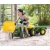 Rolly Toys 023110 Traktor Rolly Kid John Deere z łyżką i przyczepą